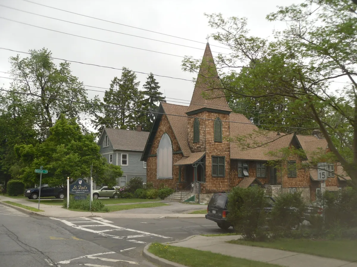 Shingled church and a neighbouring house on Maple Avenue in Chester, New York